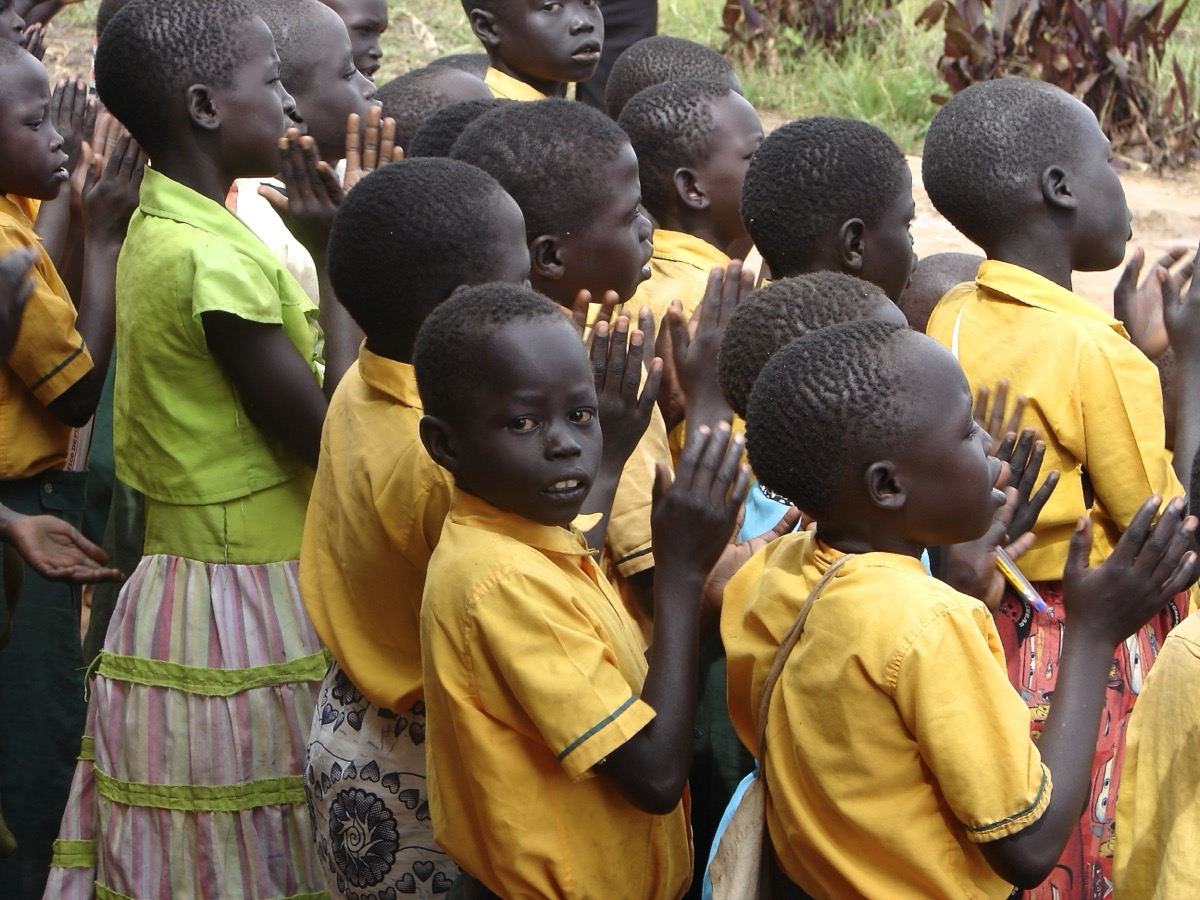 A group of children outside a building in South Sudan