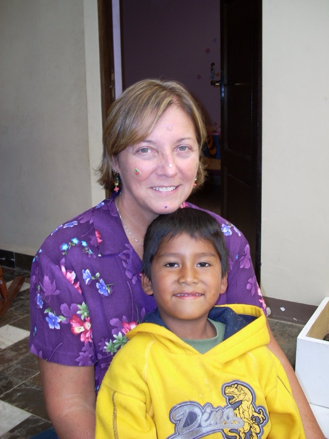 Mollie Magee with a boy at an orphanage in Bolivia